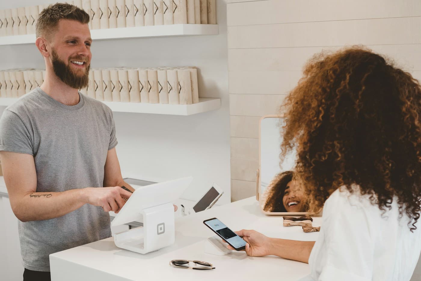 Customer making a payment at a retail counter